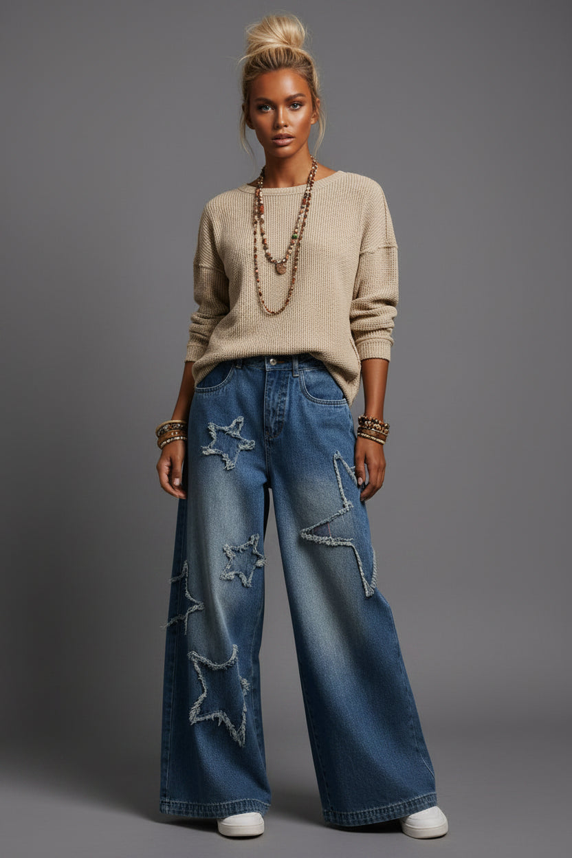 Jeans pierna ancha deslavados con estrellas