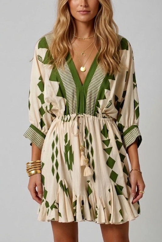 Vestido triángulos y pompones