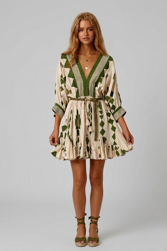 Vestido triángulos y pompones