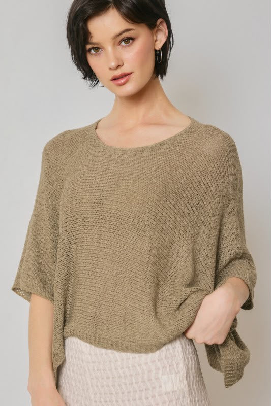 Blusa tejida asimétrica