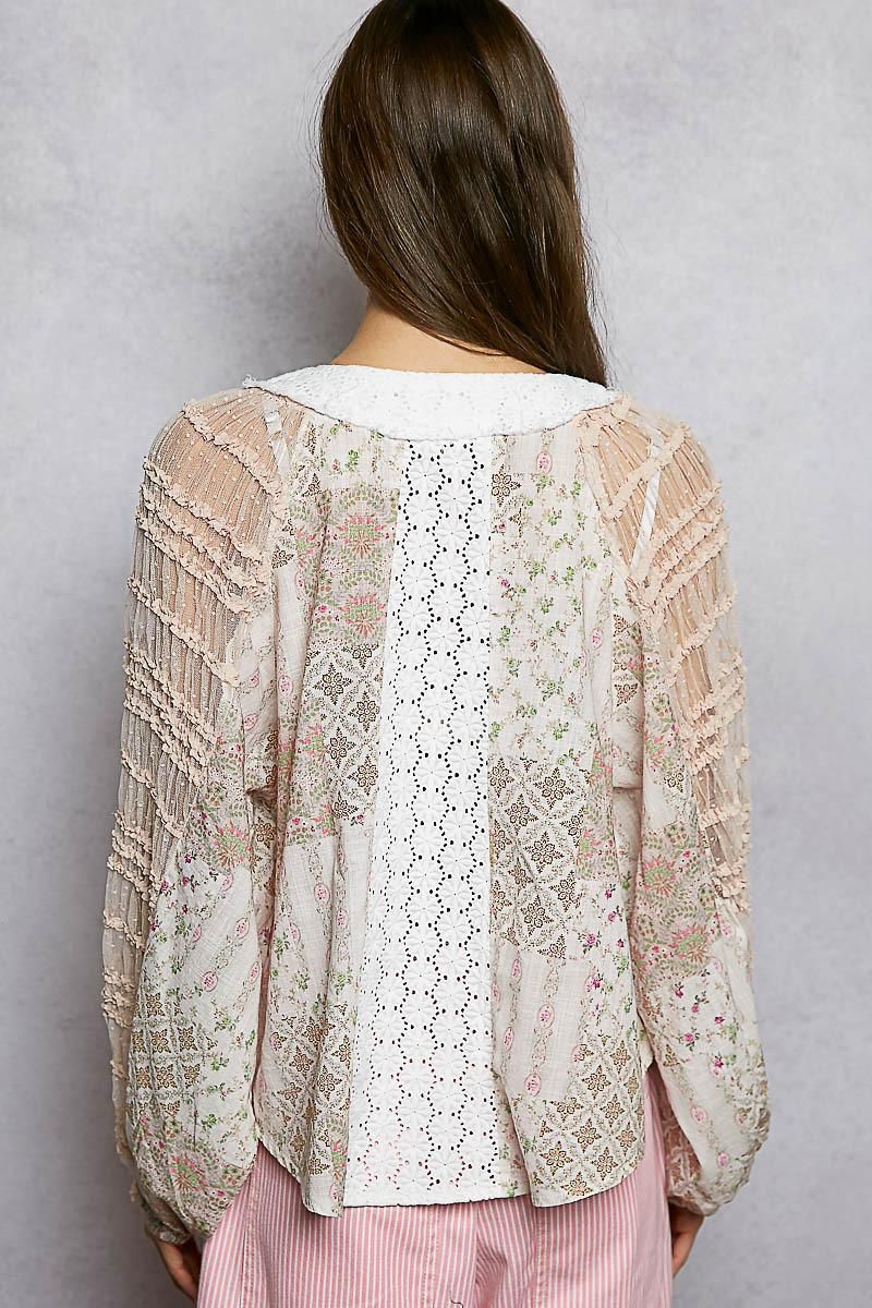 Blusa texturas con ojillos