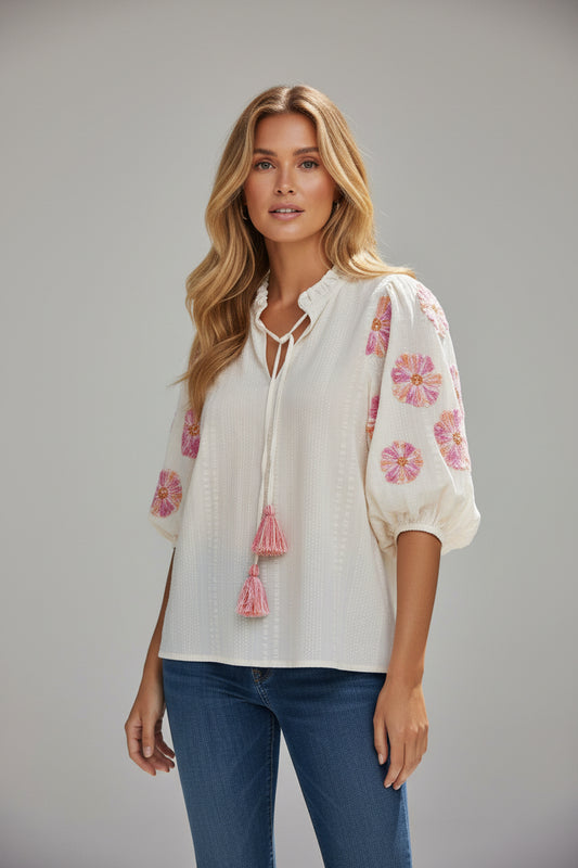 Blusa de mangas abullonadas bordadas