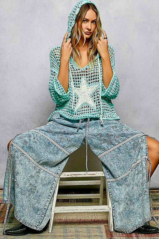 Blusa tejida con gorro y estrella