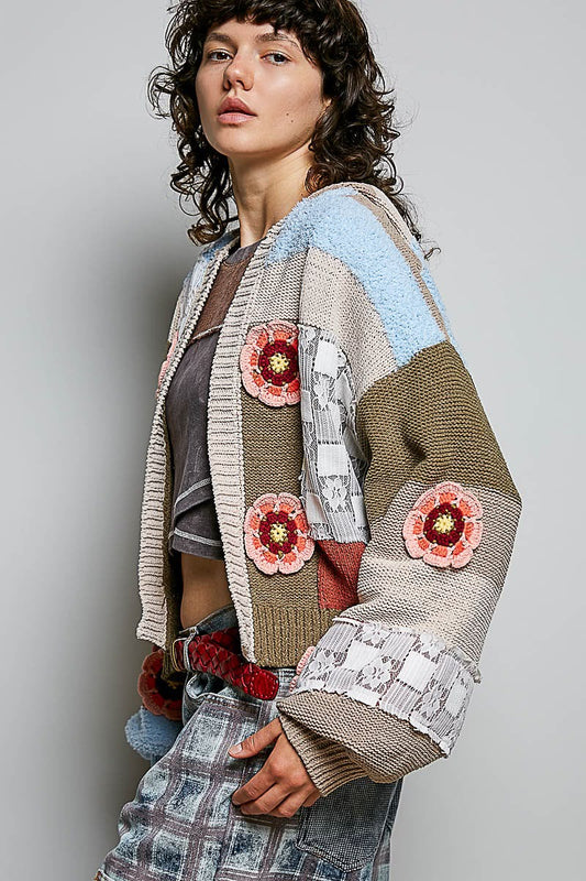 Suéter flores tejidas