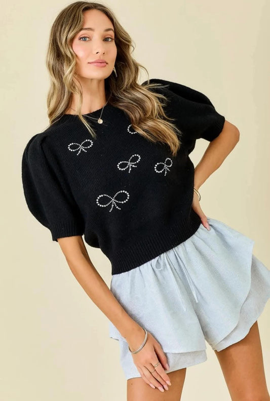 Blusa tacto suave y moños en piedras