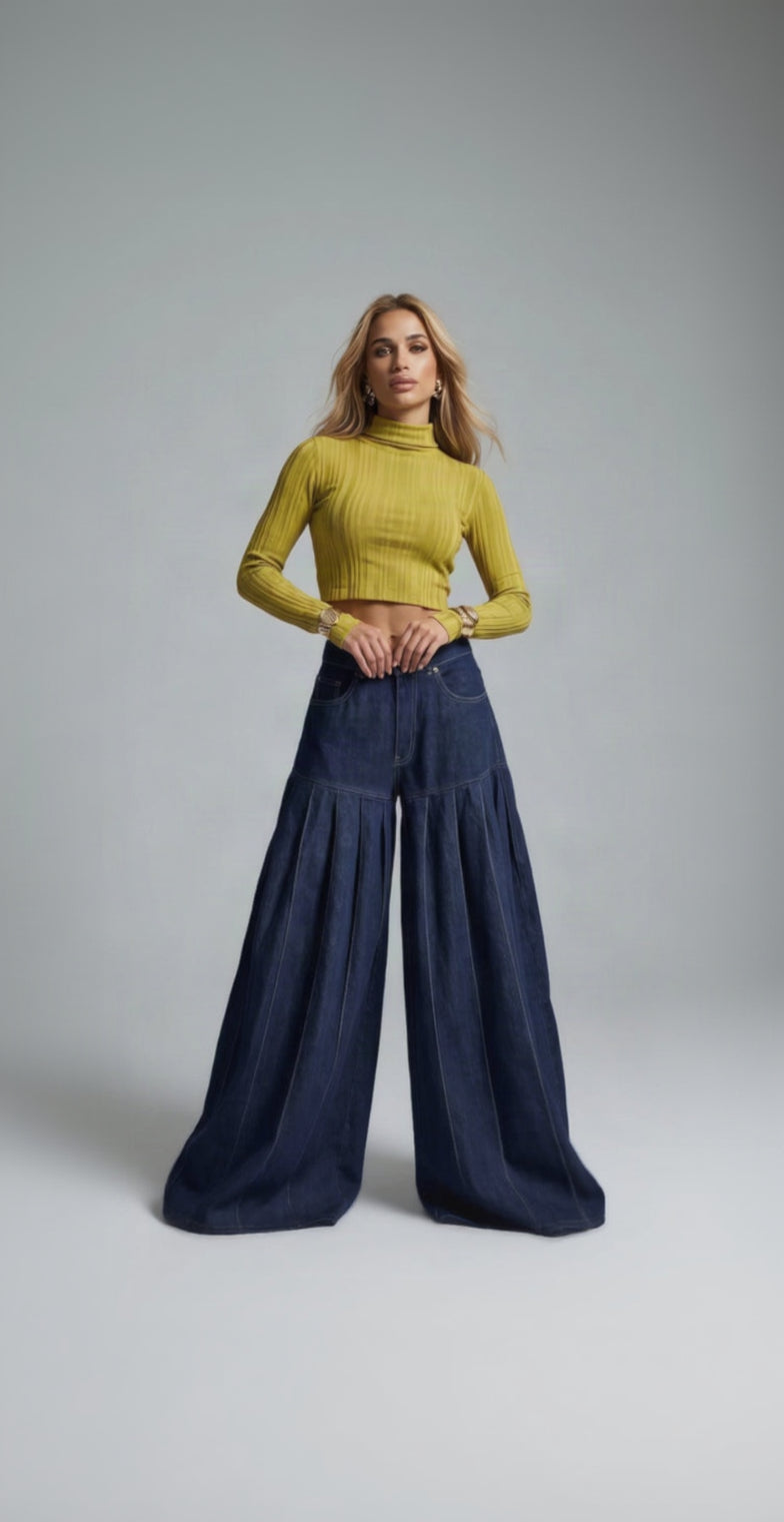 Jeans con corte y tablas.