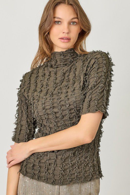 Blusa con detalle de hilos