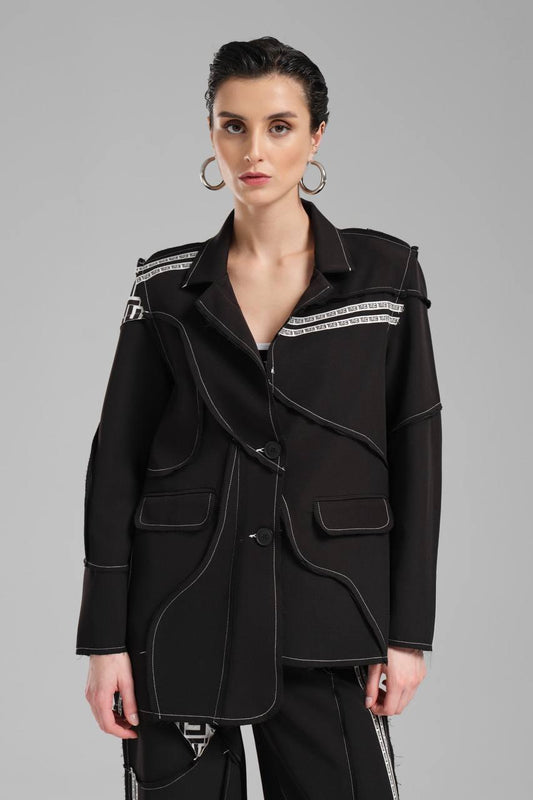 Saco con pespuntes y cortes