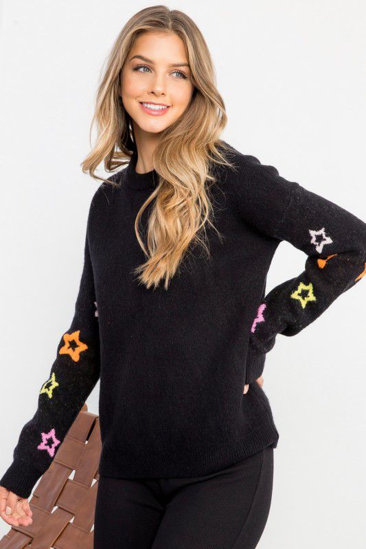 Suéter con estrellas en mangas