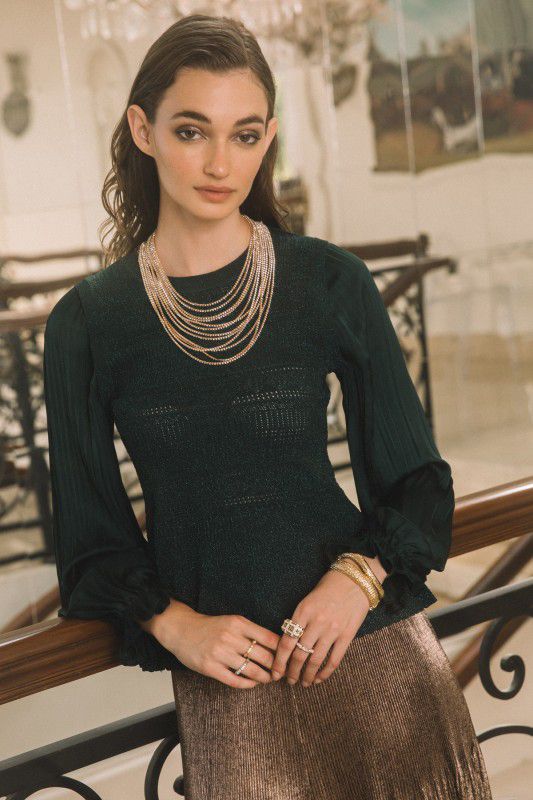 Blusa tejida con mangas en satín