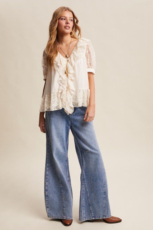 Blusa escarolas con transparencias