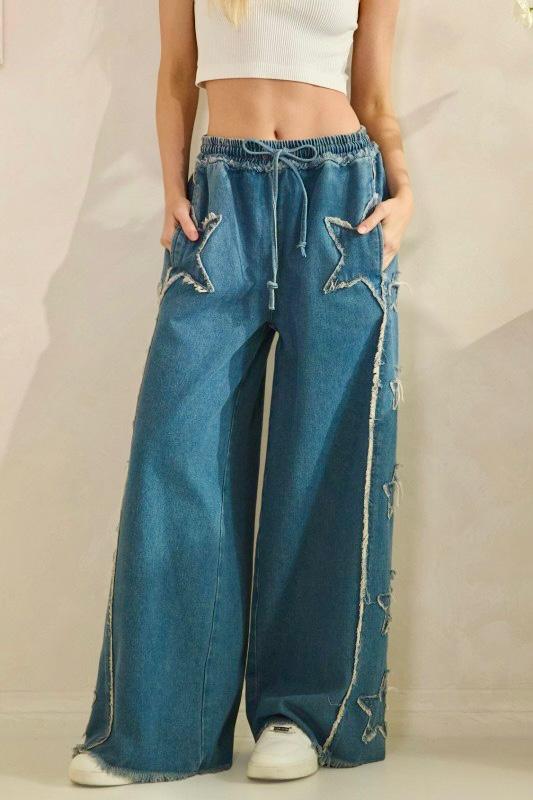 Jeans wide leg con estrellas