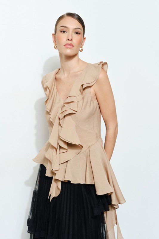 Blusa asimétrica con escarolas