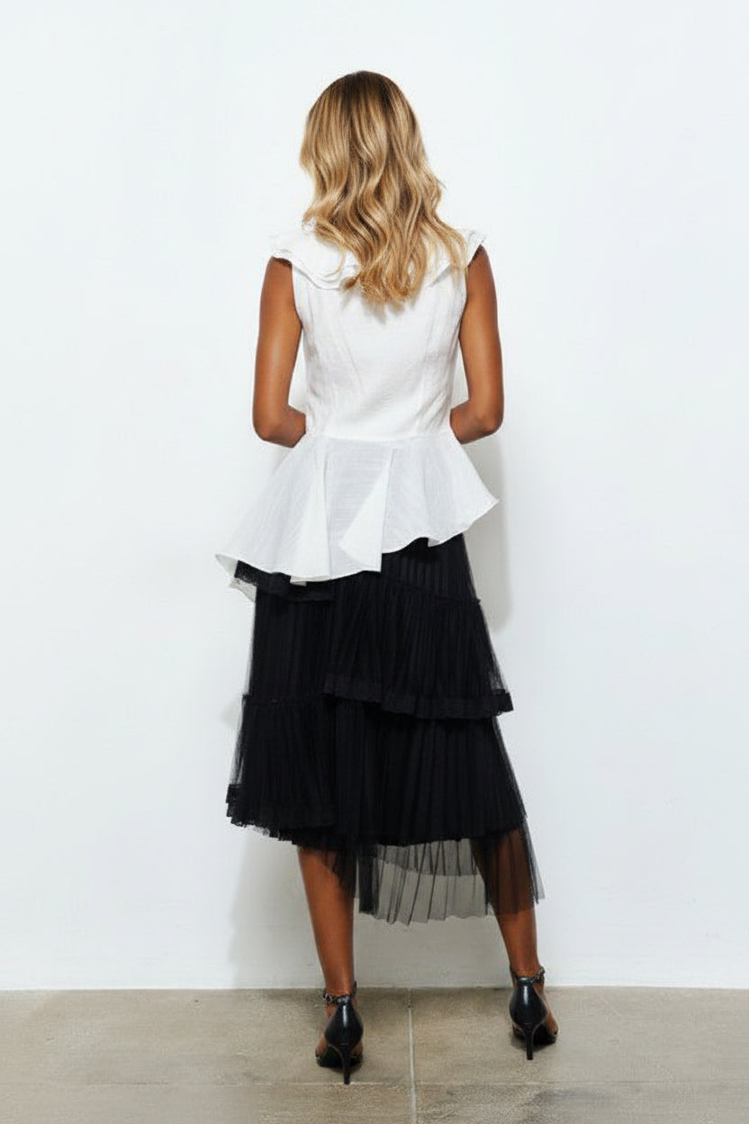 Blusa asimétrica con escarolas