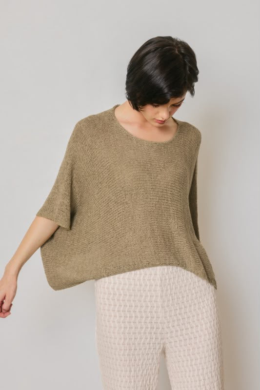 Blusa tejida asimétrica