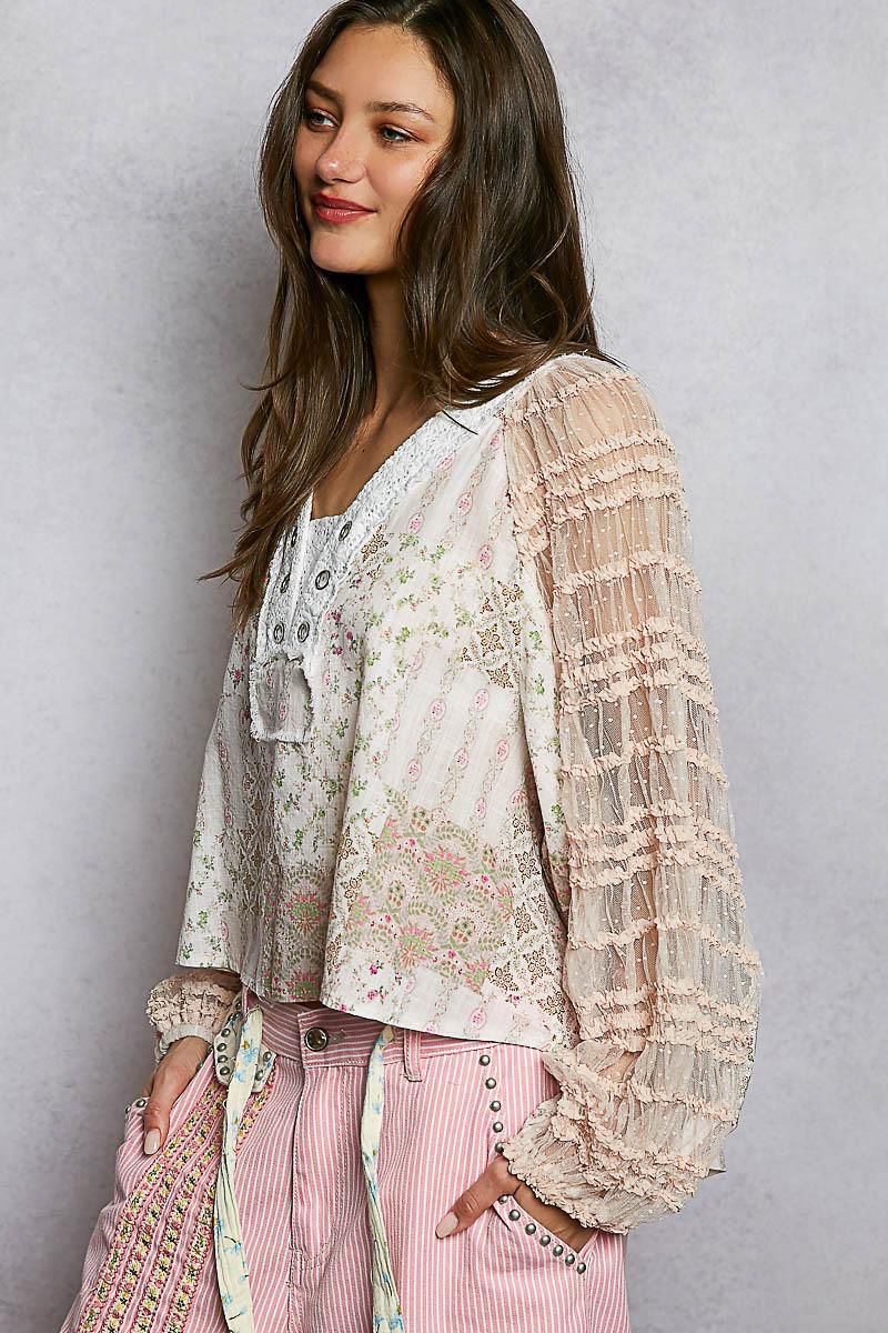 Blusa texturas con ojillos