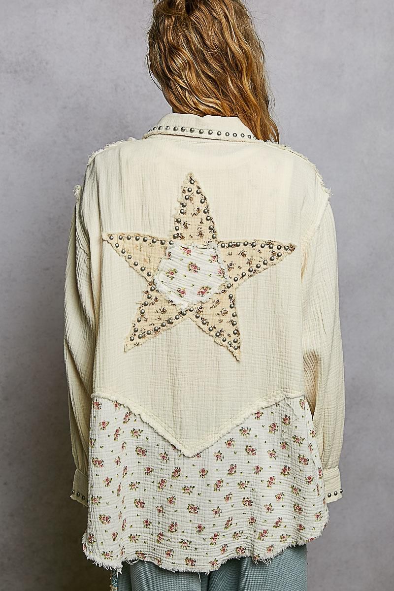 Camisola estrellas y flores