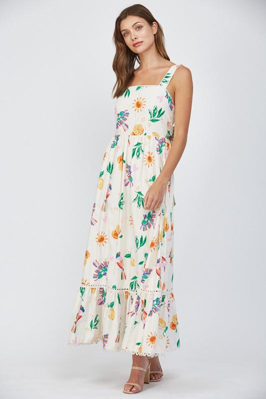 Vestido estampado con detalles de guipur y amarre en espalda