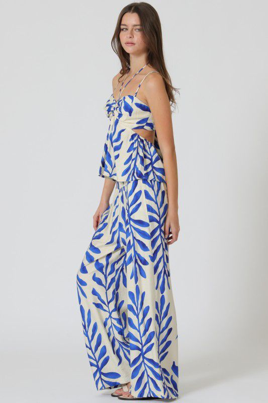 Set estampado de blusa con amarre en espalda y pantalón