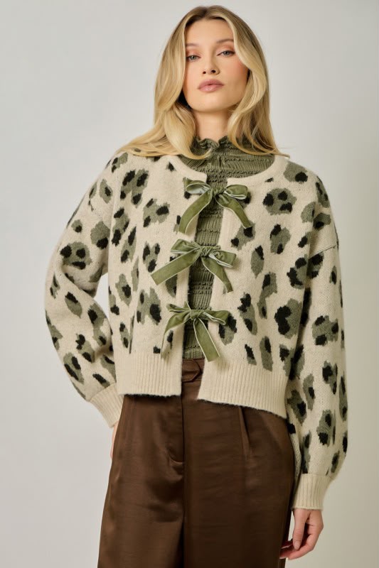 Suéter moños animal print
