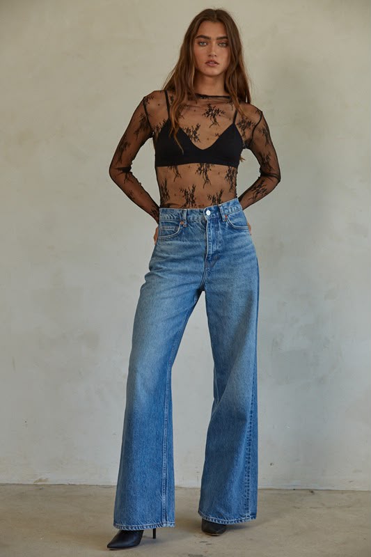 Blusa de mesh con ramos