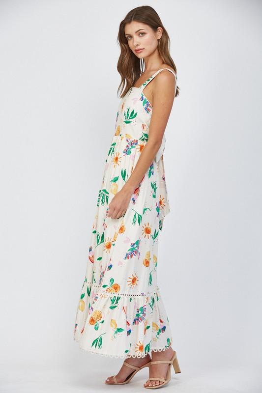 Vestido estampado con detalles de guipur y amarre en espalda