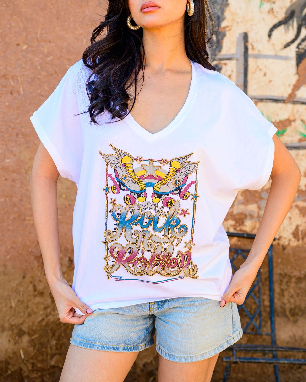 Camiseta patines y estrellas con cuentas doradas