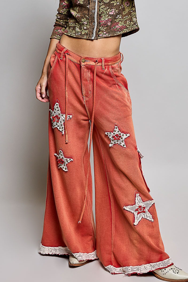 Pantalón deslavado estrellas