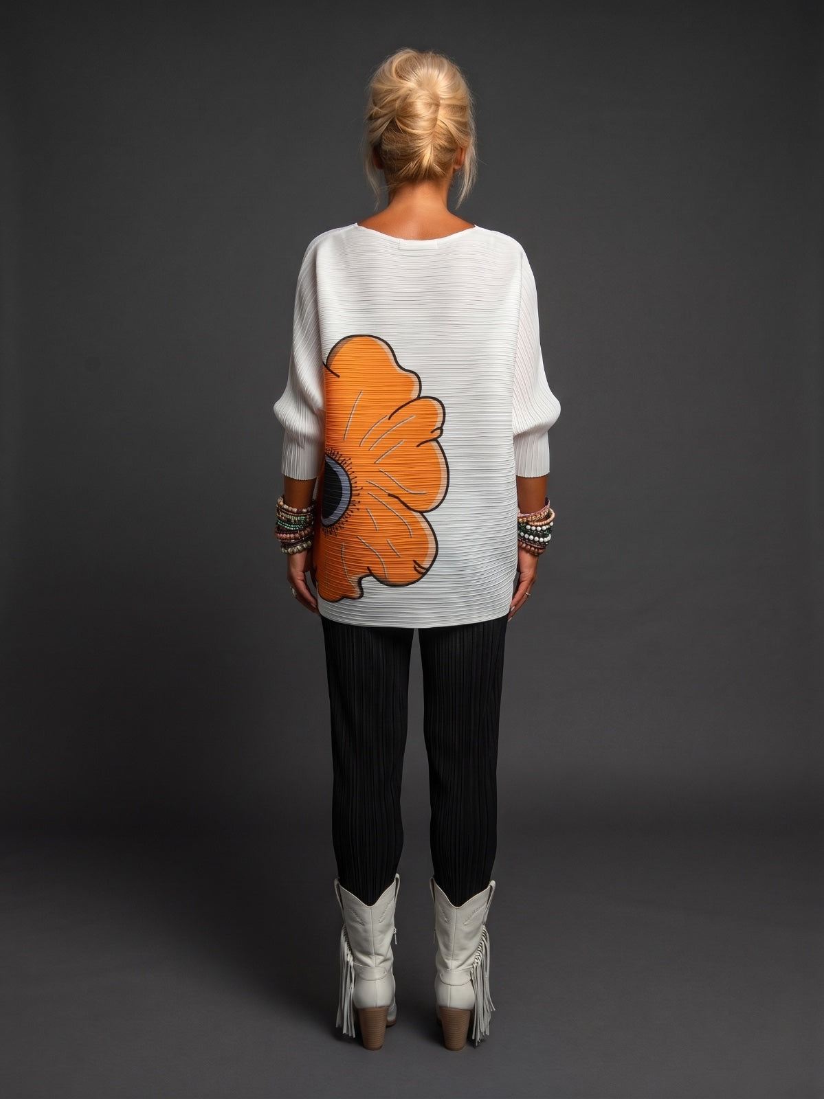 Blusa plisada flor