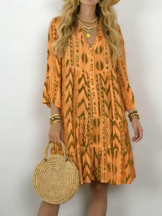 Vestido estampado dorado