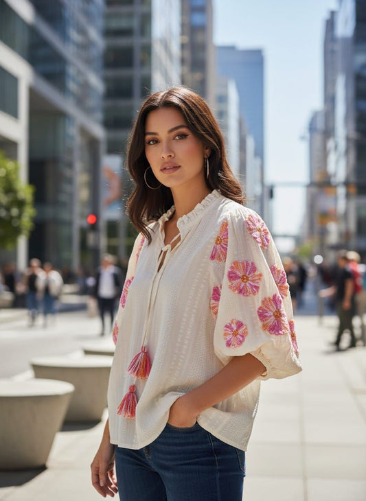 Blusa de mangas abullonadas bordadas