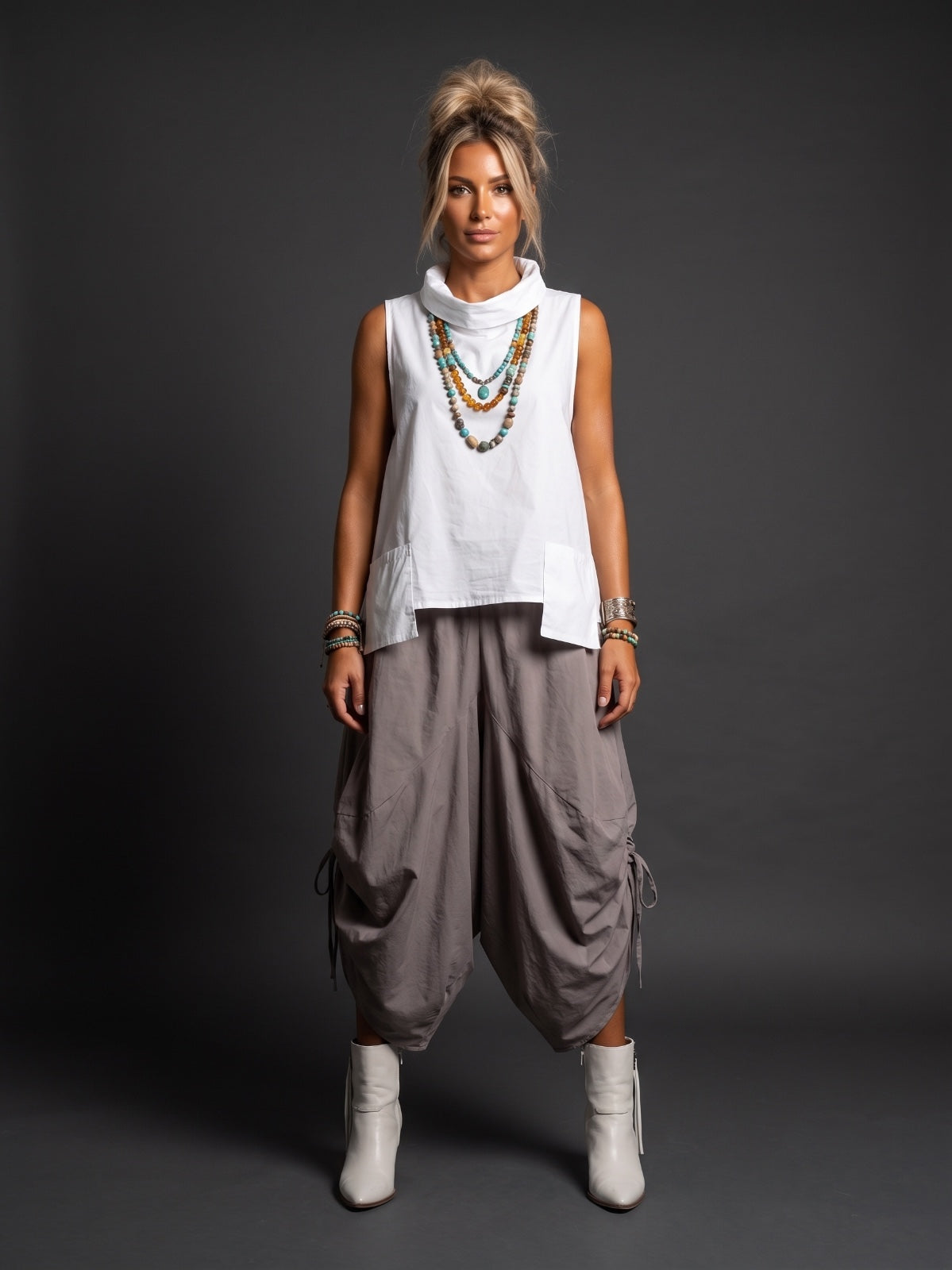 Blusa cuello y bolsas