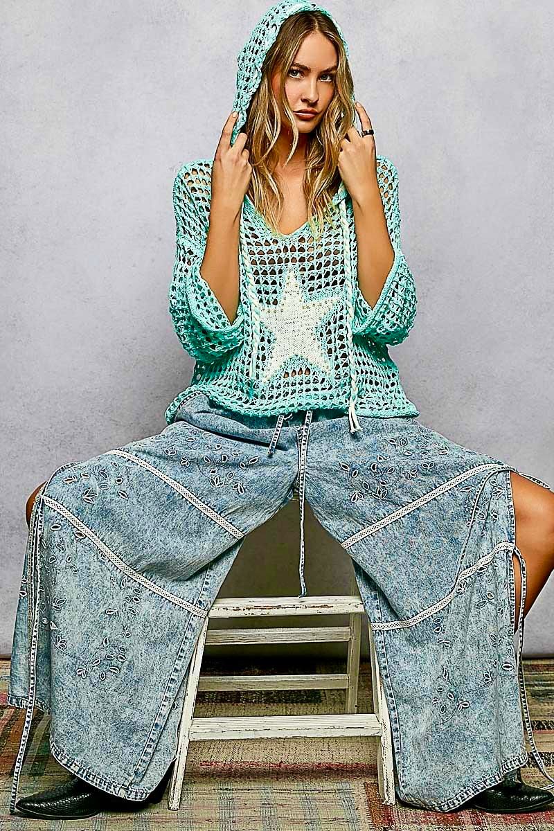 Blusa tejida con gorro y estrella