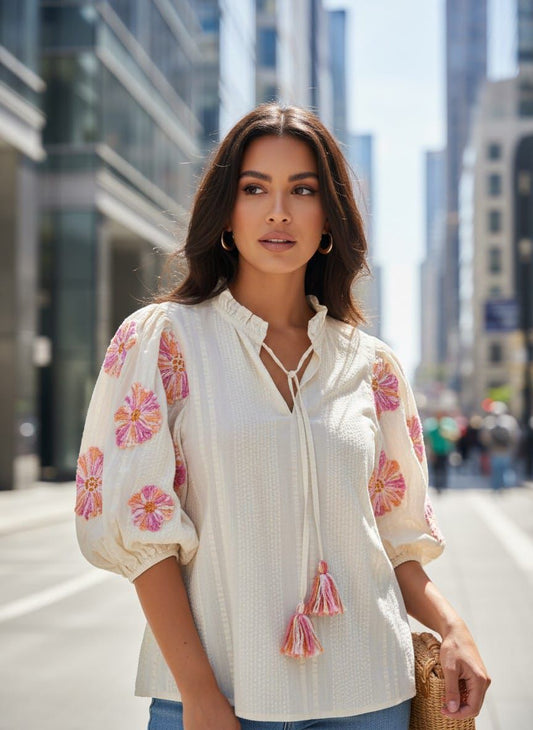 Blusa de mangas abullonadas bordadas