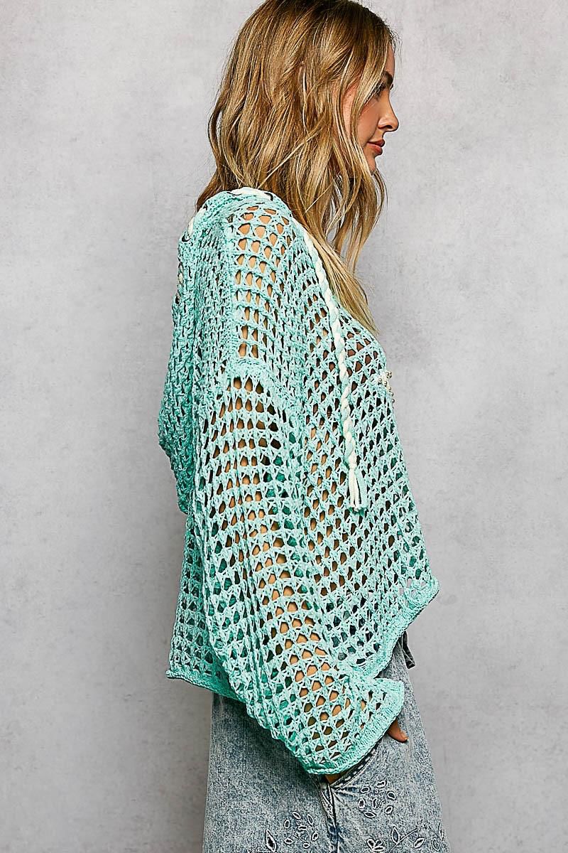 Blusa tejida con gorro y estrella