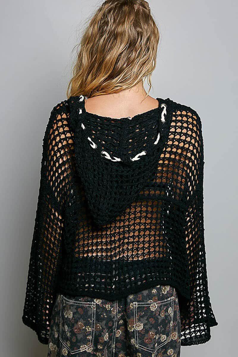 Blusa tejida con gorro y estrella