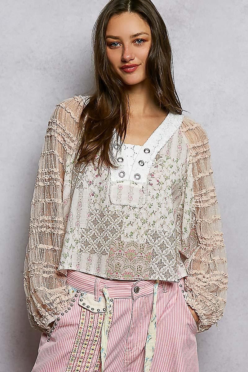 Blusa texturas con ojillos