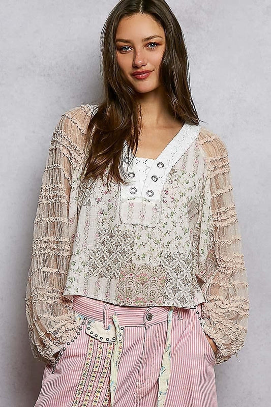 Blusa texturas con ojillos