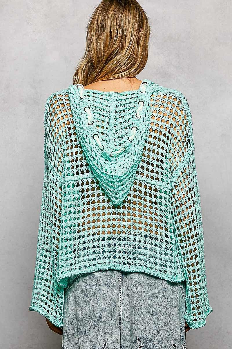 Blusa tejida con gorro y estrella